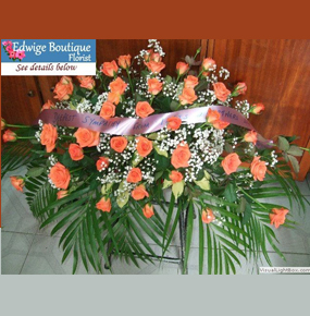 Salmon Colored Roses Casket Spray