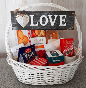 Feel Good Hamper Basket with tea, biscuits, wine, mug, chocolates and more